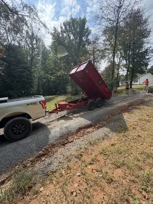 Trailer dumping debris on a job